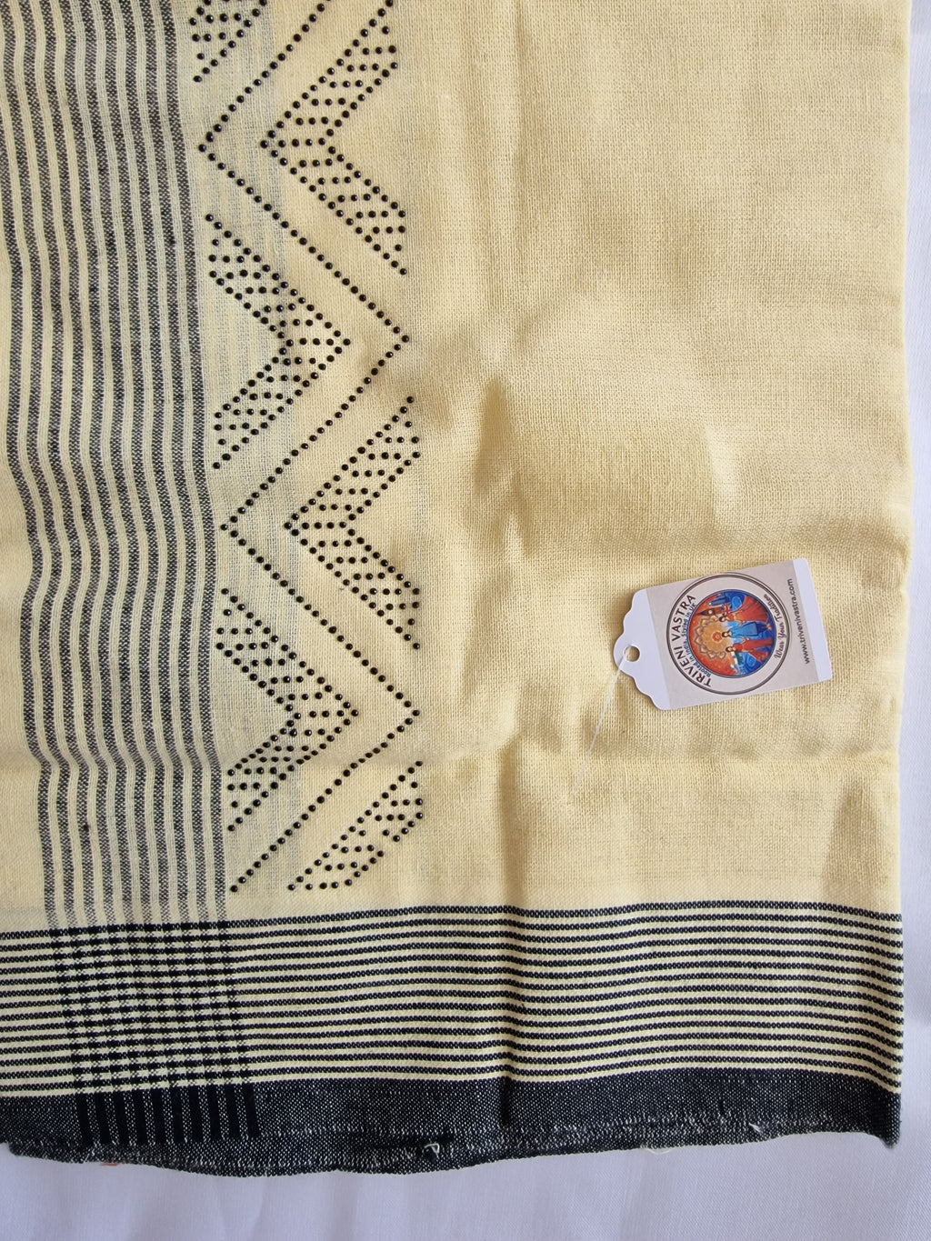 Yellow cotton mundu (dhoti) with black stones
