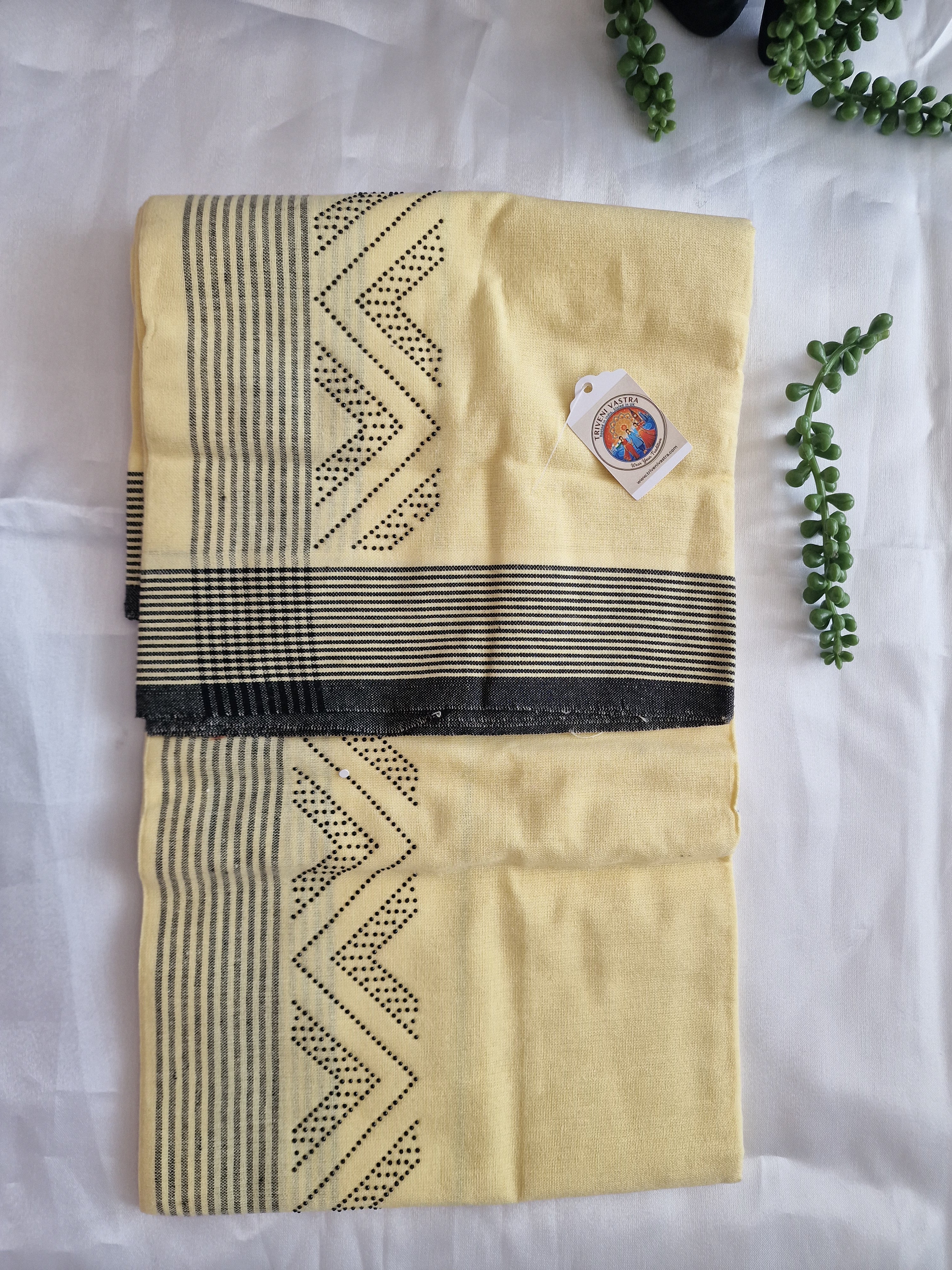 Yellow cotton mundu (dhoti) with black stones