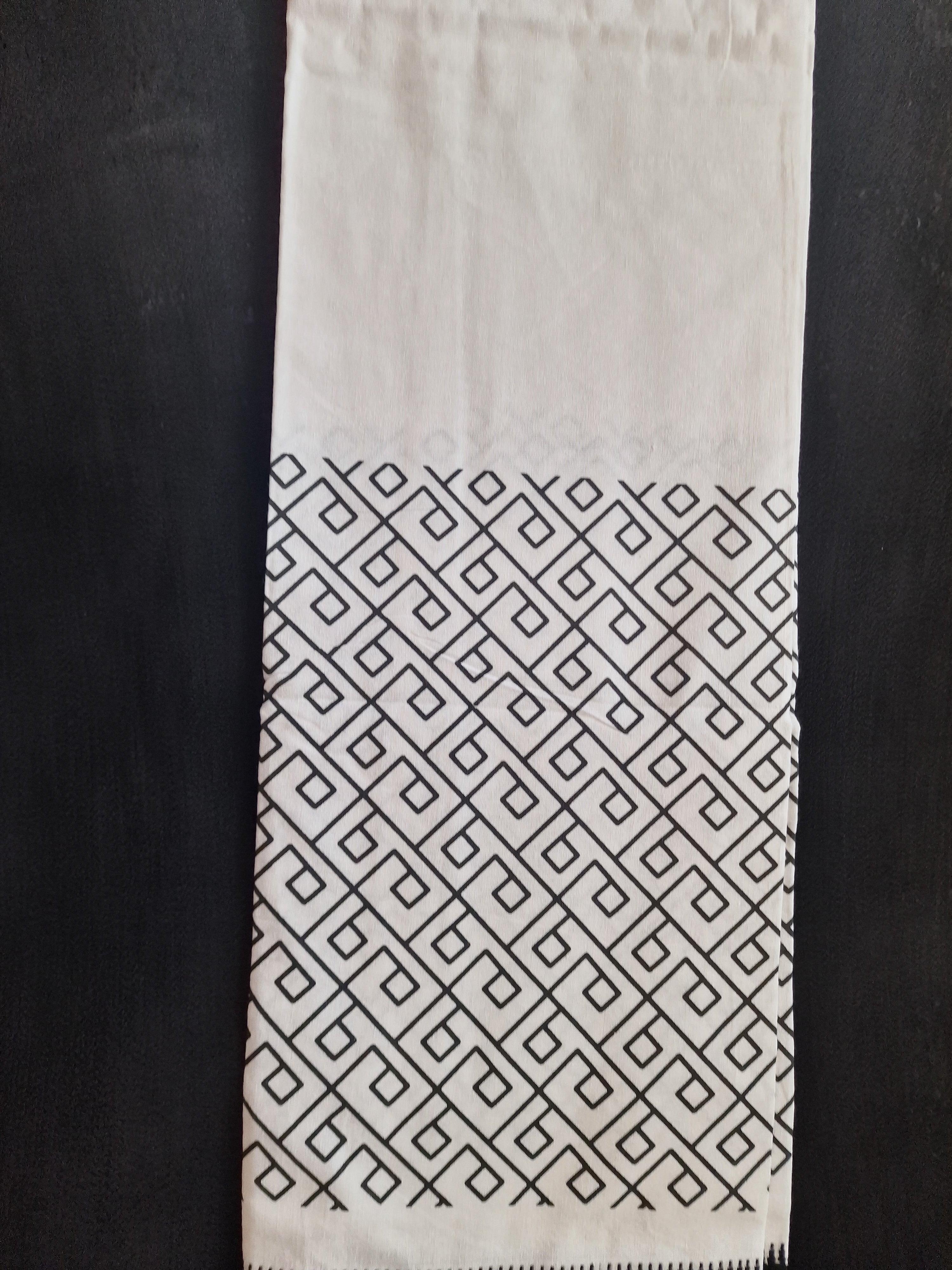 White cotton mundu ( Dhoti) with black embellishments
