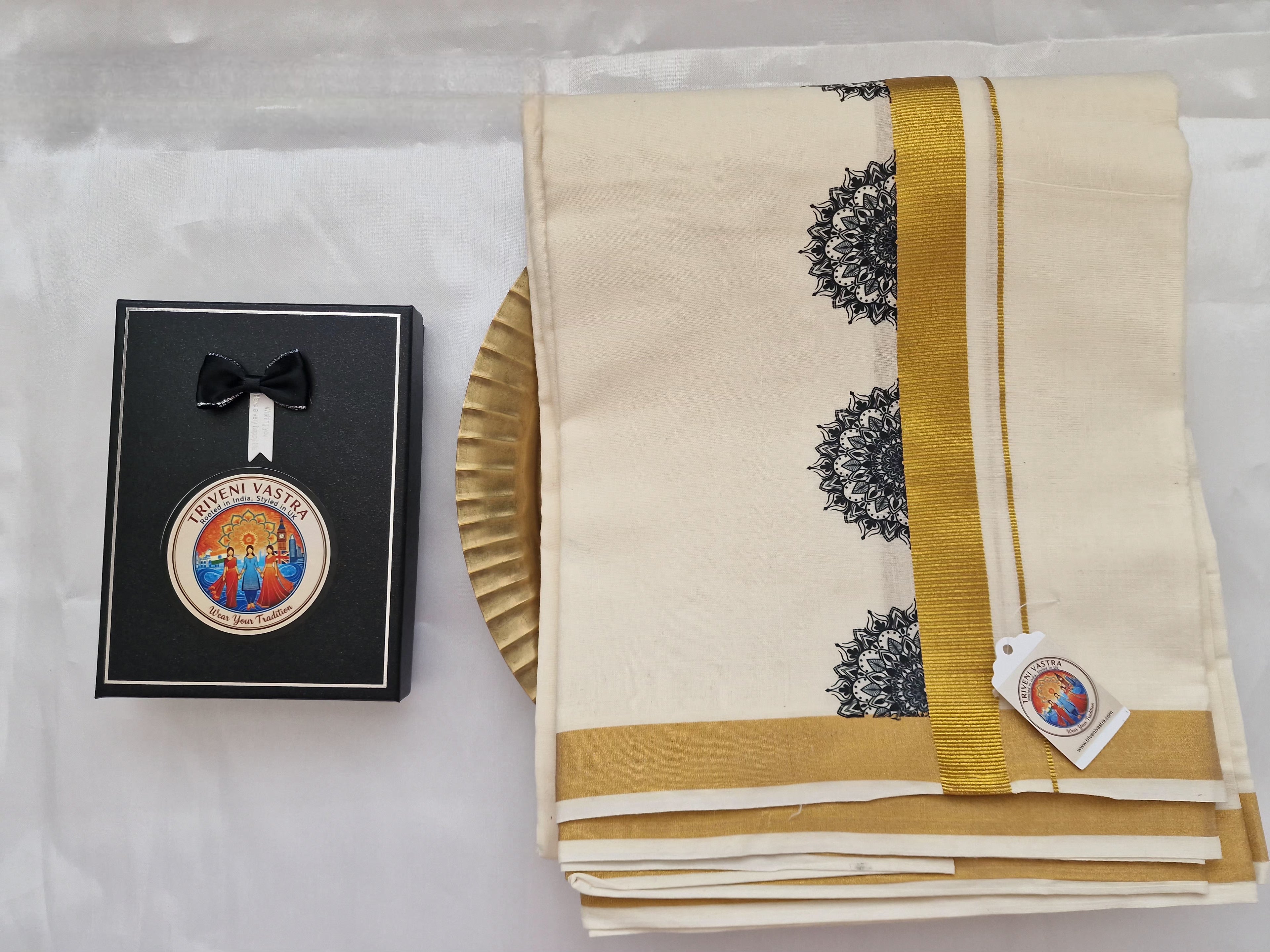 Kasavu mundu (dhoti) with black mandala pattern print