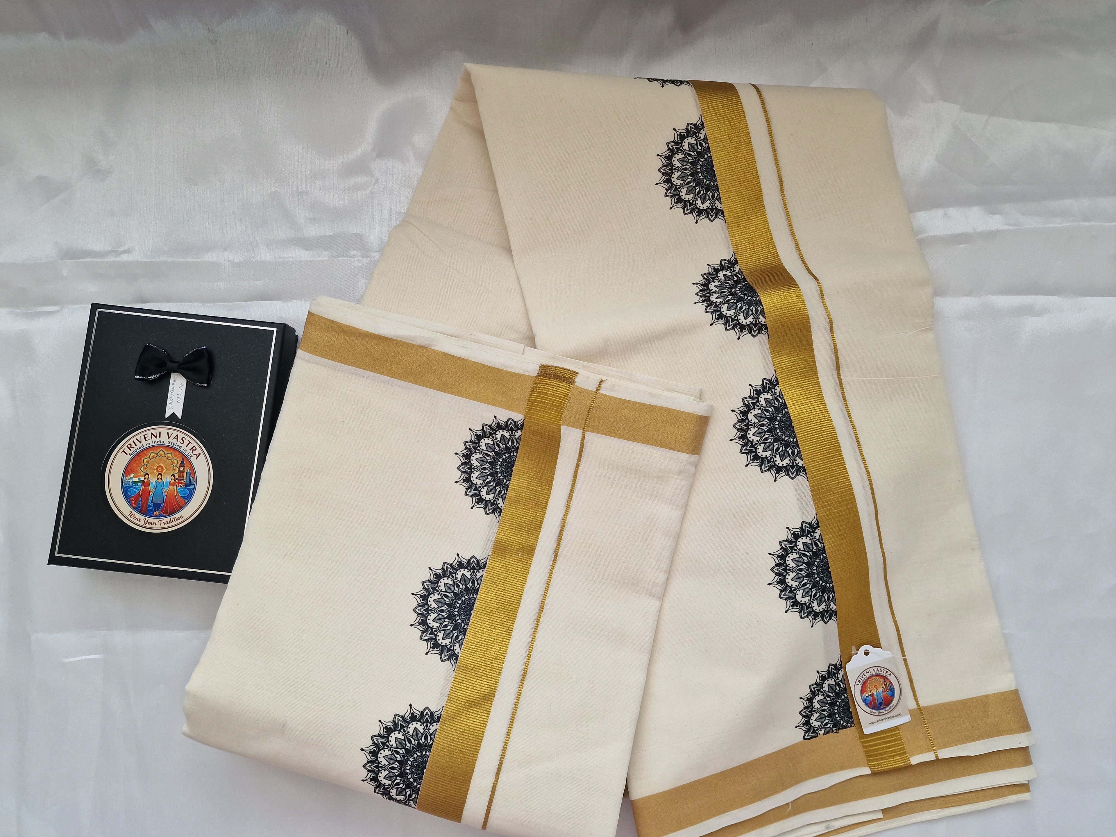 Kasavu mundu (dhoti) with black mandala pattern print