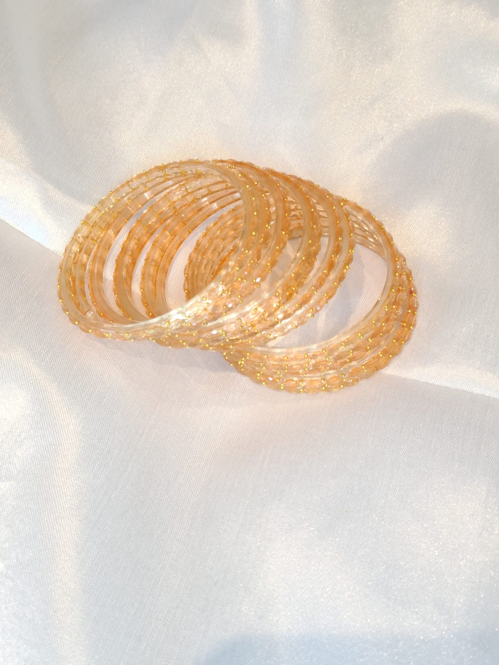 Glass bangles golden