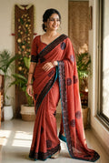 Brick colour georgette saree with running blouse